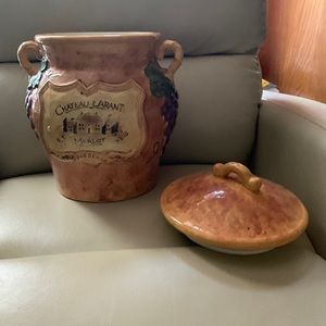 Ceramic Jar w/ wine decoration design. No cracks, or damage.